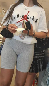 Amazing girl in grey spandex shorts at the mall, closeups of her firm hot ass and her crotch