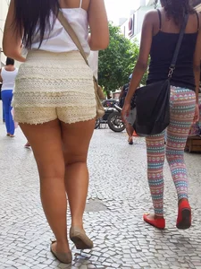 Big ass in shorts and ebony friend in leggings