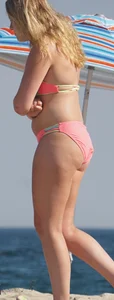 Thick blonde bikini babe on the beach