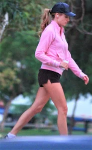 Beautiful skinny girl out for a walk in little shorts