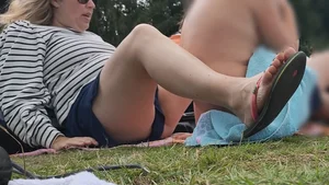 Mom at a lake with a glimpse of panties