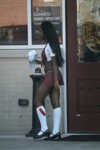 Sexy ebony Tilted Kilt employee in her uniform