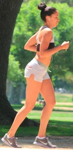 Ebony babe in Hooters shorts out for a run and walk