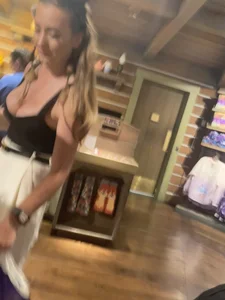 Dirty blond with her cleavage out at Disneyland