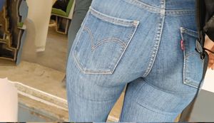 Hot booty in tight bue jeans closeups