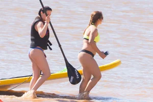Candid beach girls in thongs