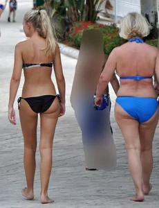 Sexy blonde bikini girl walking with mom