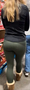 Cute costco blonde in dark green leggings  (NOT OC)