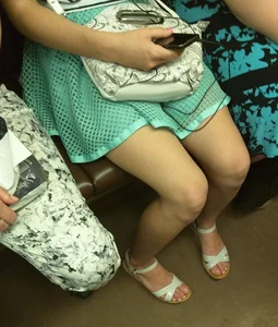 Girl in a Dress and Sandals in the Subway Train Creepshot