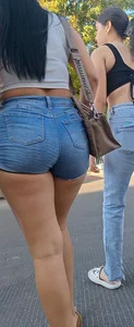 super sexy denim short shorts on this brunette with tremendous legs and big butt
