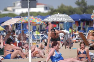 Girls on a nude beach in Bibione, Italy