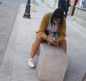 Long-legged girl, distracted