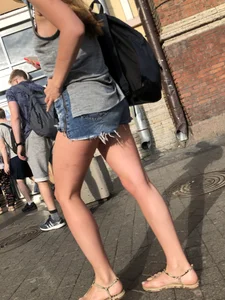 Girl in Denim Mini Shorts and Sandals With Sexy Legs And Feet Street and Subway Photos