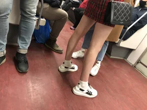 Hot slim legs in subway