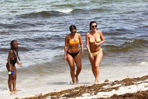 Frankie Bridge nip slips in a bikini on the beach