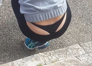 Short haired milf sitting showing her thong