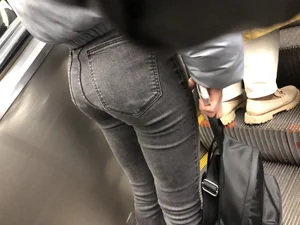 Candid girl with an incredible ass in grey jeans subway creepshots