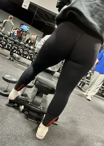 Thick booty working out at the gym in black leggings