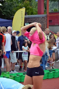Sexy blonde track sprinter changing after a race