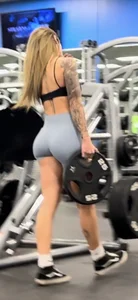 Petite blonde with bubble butt in blue spandex shorts