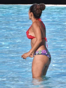Hot ass milf with an amazing body at the pool
