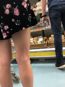 Girl With Amazing Legs on Hight Heeled Sandals at the Supermarket Closeup Photos