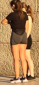 Girl exercises her cute butt in public at sunset