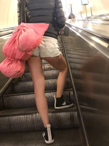 Hot Milf in Mini Shorts on the Subway Escalator and in the Train Candid Gallery