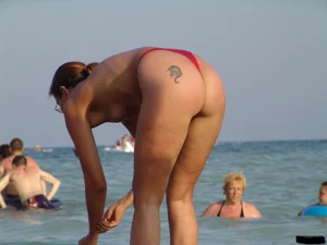 A bunch of sexy beach voyeur babes in bikinis, thongs and topless