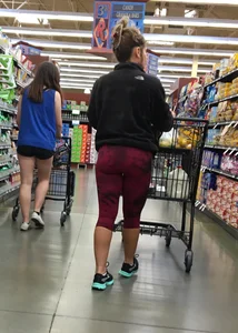 Milf grocery shopping in red leggings with a great ass