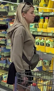 Cute petite wife with nice legs at the market (face)
