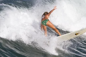 Candid surfer babes on the beach and in bikinis