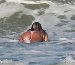 Hot surfer chicks out in the water