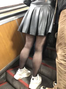 Redhead Girl in a Leather Dress And Black Pantyhose - Sexy Legs Closeup on the Subway Escalator Creepshots Gallery