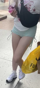 Sexy blonde in green shorts