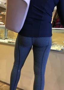 Brunette jewelry shopping in leggings with a nice ass