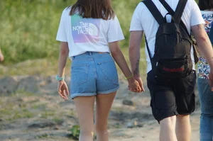 Ass and Thin Legs in Blue Denim Shorts Beach Creepshot