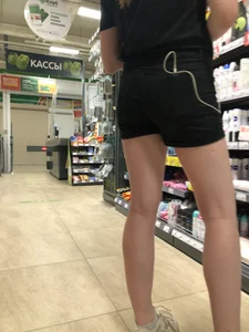 Girl with Hot Ass and Legs in Black Denim Shorts Store Creepshots