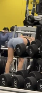 Petite blonde with bubble butt in blue spandex shorts