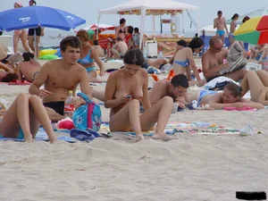 Beach voyeur girls in bikinis, thongs and topless