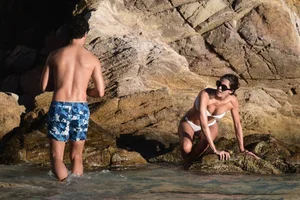 Iris Mittenaere in a white thong bikini on the beach in St Martin