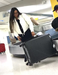 2 pretty ebony juicy booty at airport and bending over