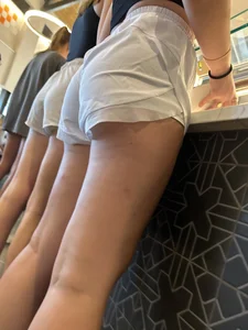 College girls lining up for lunch showing off