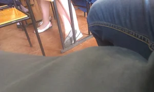 Candid Teen Girls’ Legs Under Desk in Class
