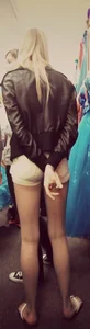 Skinny blonde girl in little yellow shorts with a tight ass