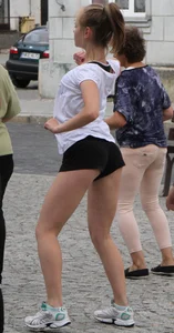 Girl Working Out on the City Street Candid Photos