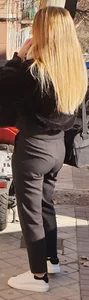 Tiny blonde in black pants