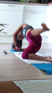 Sexy girlfriend doing yoga at home in leggings