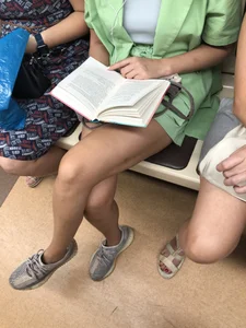Hot candid crossed legs in a subway train creepshot