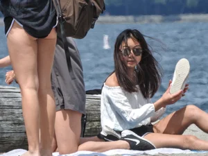 Blondie and two asian girls put on sunscreen (pt 2) [062]